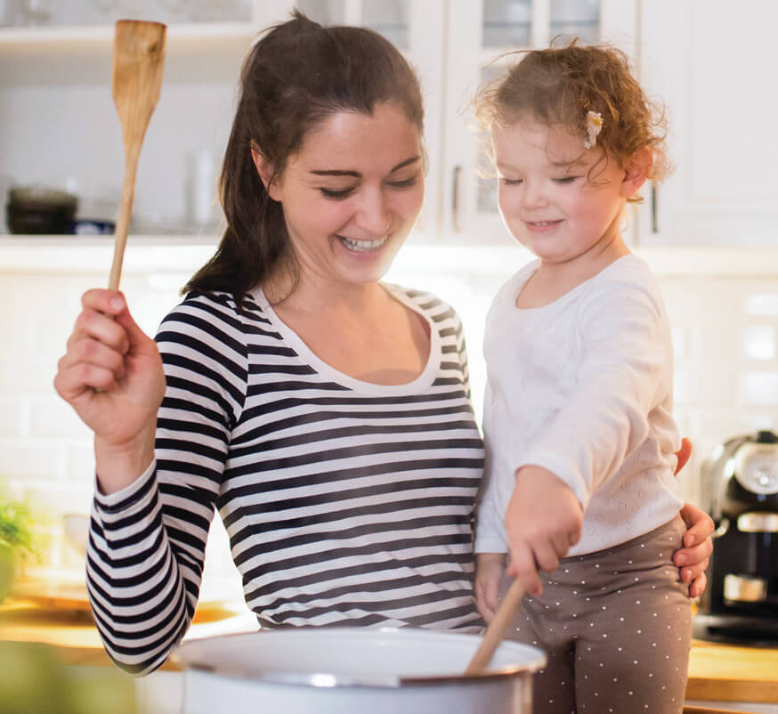 Mom Daughter Cooking